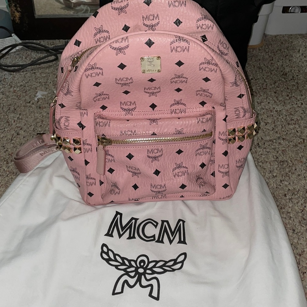Brand new without tags; comes with dustbag